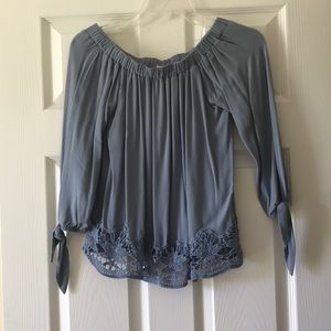 Living doll off the shoulder shirt